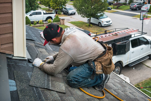 Professional Roofing technician working in Utica, IL